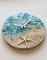 Pacific Northwest studio resin wall clock with sandy shore design and silver quartz hands